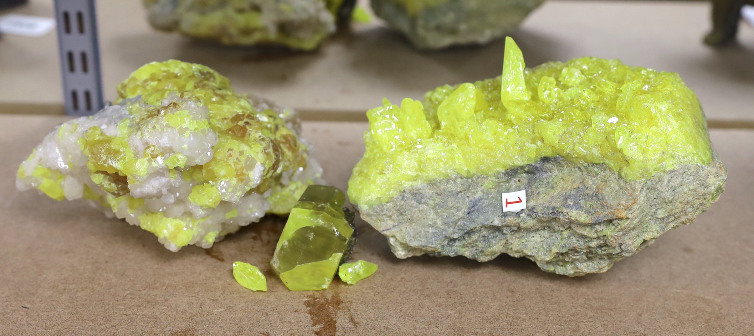 Three sulphur crystals, largest 13cm x 23cm